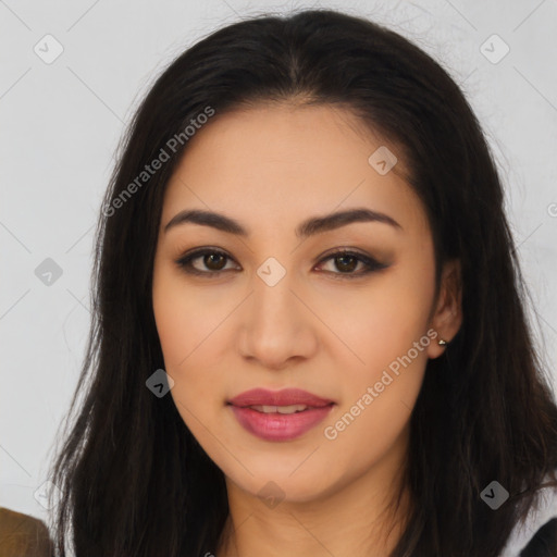 Joyful latino young-adult female with long  brown hair and brown eyes