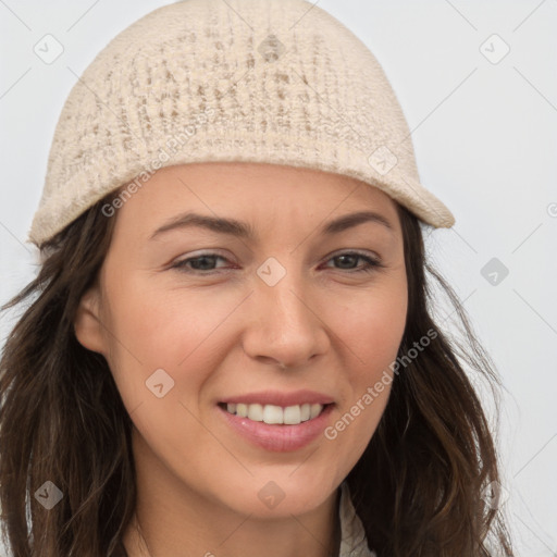 Joyful white young-adult female with long  brown hair and brown eyes