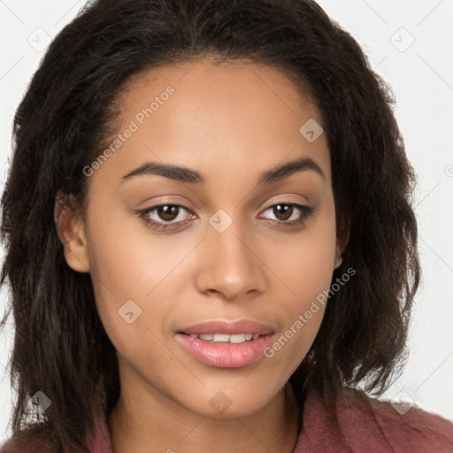 Joyful latino young-adult female with long  brown hair and brown eyes