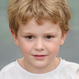 Joyful white child male with short  brown hair and brown eyes