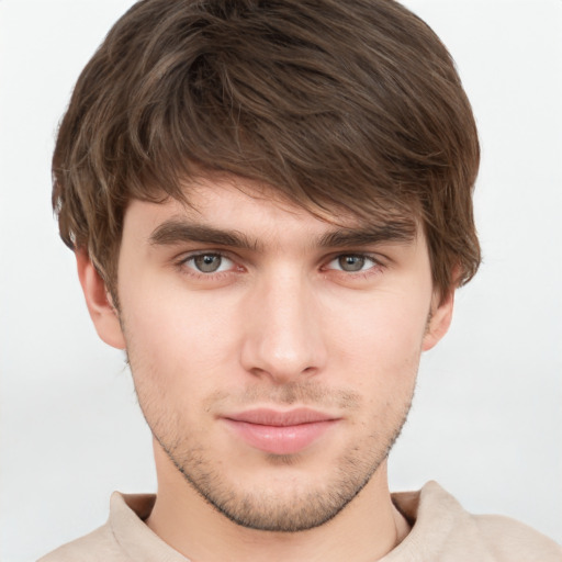 Neutral white young-adult male with short  brown hair and grey eyes