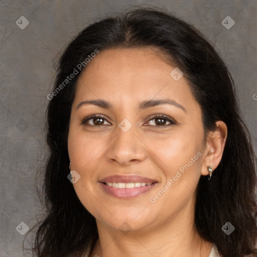 Joyful white adult female with long  brown hair and brown eyes