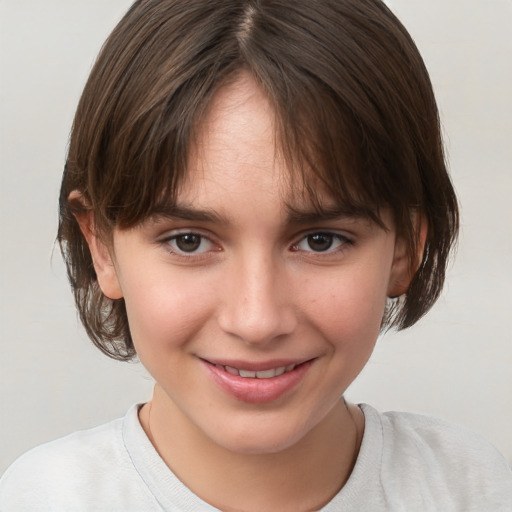 Joyful white child female with medium  brown hair and brown eyes