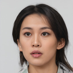 Neutral asian young-adult female with medium  black hair and brown eyes