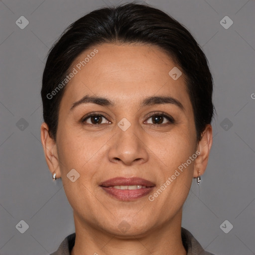 Joyful white adult female with short  brown hair and brown eyes