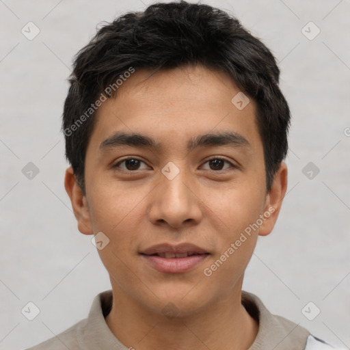 Joyful asian young-adult male with short  black hair and brown eyes