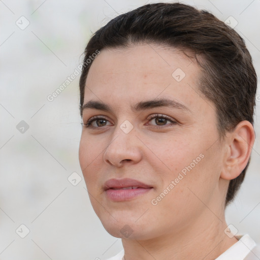 Joyful white young-adult female with short  brown hair and brown eyes