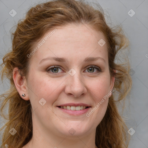 Joyful white young-adult female with long  brown hair and blue eyes