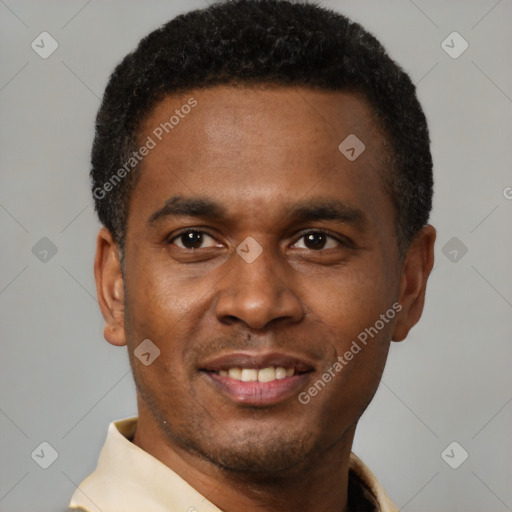 Joyful latino young-adult male with short  brown hair and brown eyes