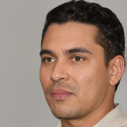 Neutral white young-adult male with short  black hair and brown eyes