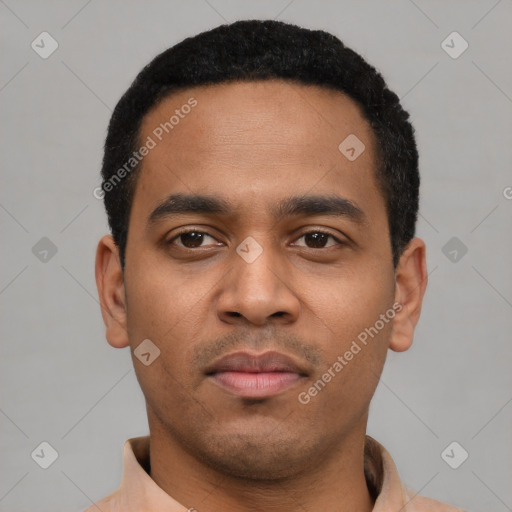 Neutral latino young-adult male with short  black hair and brown eyes