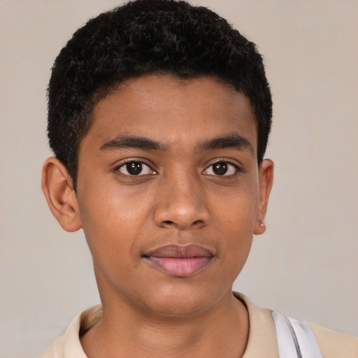 Joyful latino young-adult male with short  brown hair and brown eyes