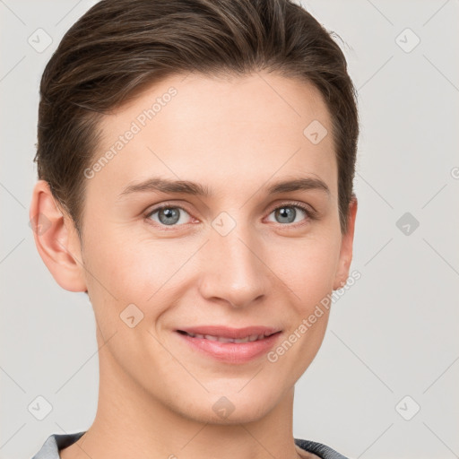 Joyful white young-adult female with short  brown hair and grey eyes