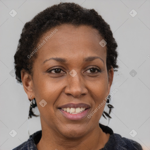 Joyful latino adult female with short  brown hair and brown eyes