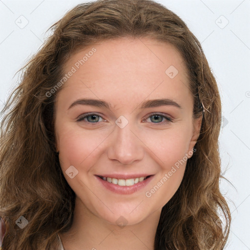 Joyful white young-adult female with long  brown hair and green eyes