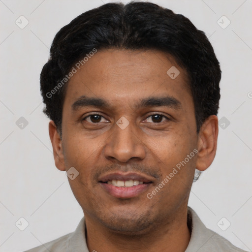 Joyful latino young-adult male with short  black hair and brown eyes