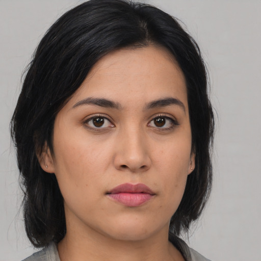 Neutral asian young-adult female with medium  black hair and brown eyes