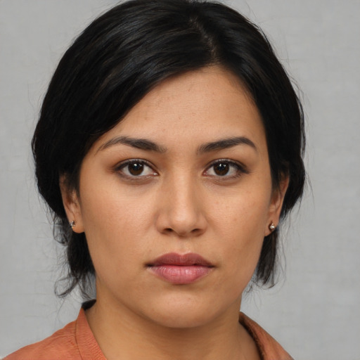 Neutral asian young-adult female with medium  black hair and brown eyes