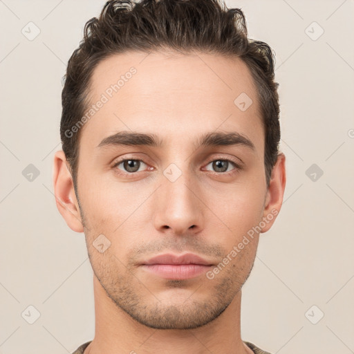 Neutral white young-adult male with short  brown hair and brown eyes