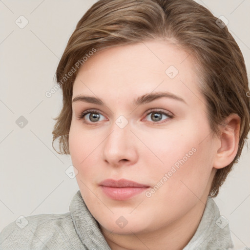 Neutral white young-adult female with medium  brown hair and grey eyes