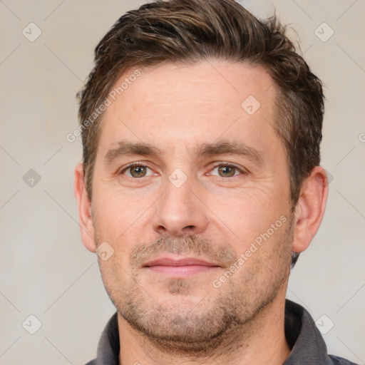 Neutral white adult male with short  brown hair and brown eyes