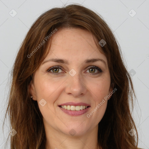 Joyful white young-adult female with long  brown hair and green eyes