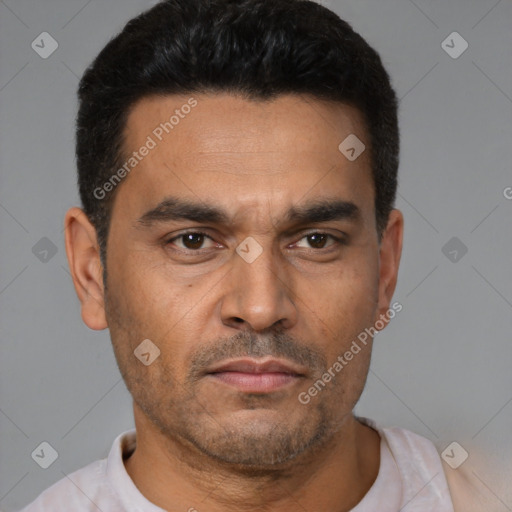 Neutral latino young-adult male with short  black hair and brown eyes