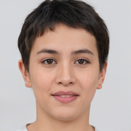 Joyful asian young-adult female with short  brown hair and brown eyes