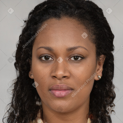 Neutral black young-adult female with long  brown hair and brown eyes