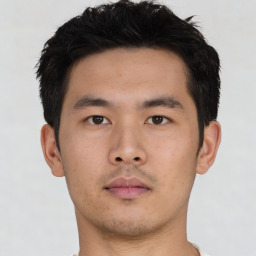 Neutral asian young-adult male with short  black hair and brown eyes