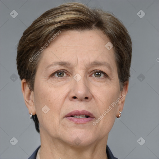 Joyful white adult female with short  brown hair and grey eyes