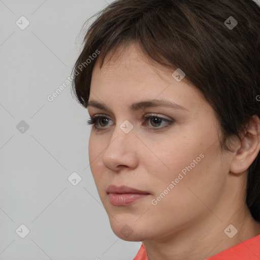 Neutral white young-adult female with short  brown hair and brown eyes