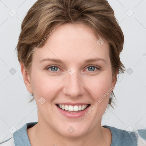 Joyful white young-adult female with medium  brown hair and blue eyes