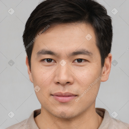 Neutral asian young-adult male with short  brown hair and brown eyes