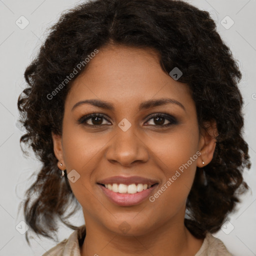 Joyful black young-adult female with medium  brown hair and brown eyes