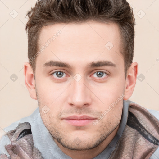 Neutral white young-adult male with short  brown hair and grey eyes