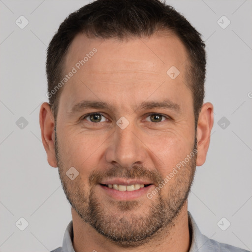 Joyful white adult male with short  brown hair and brown eyes