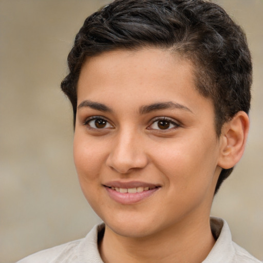 Joyful latino young-adult female with short  brown hair and brown eyes