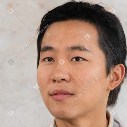 Neutral asian young-adult male with short  black hair and brown eyes