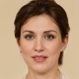 Joyful white adult female with short  brown hair and brown eyes