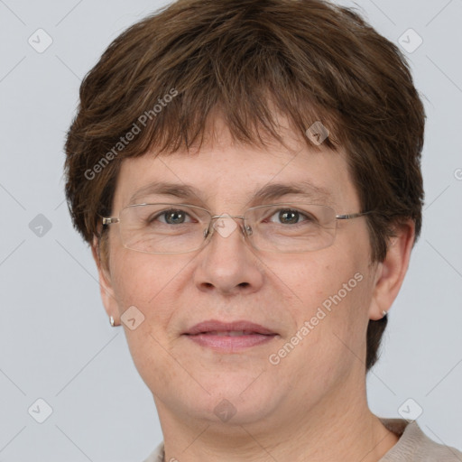 Joyful white adult female with short  brown hair and grey eyes