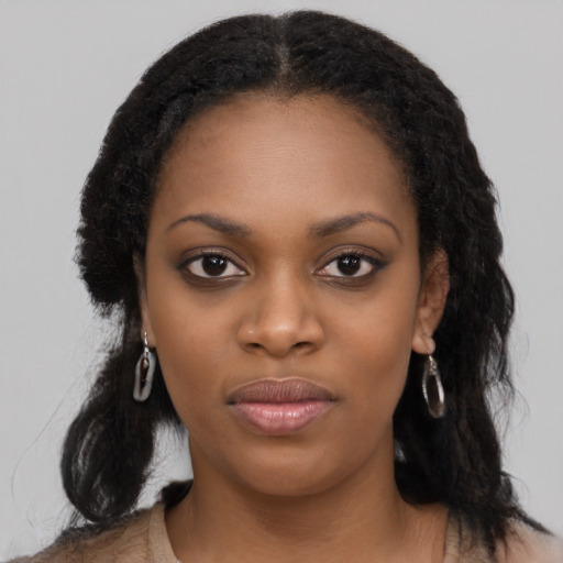 Neutral black young-adult female with long  black hair and brown eyes