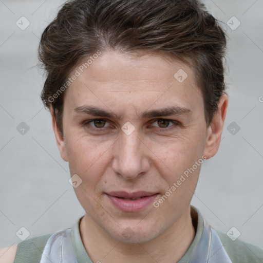 Joyful white adult male with short  brown hair and grey eyes