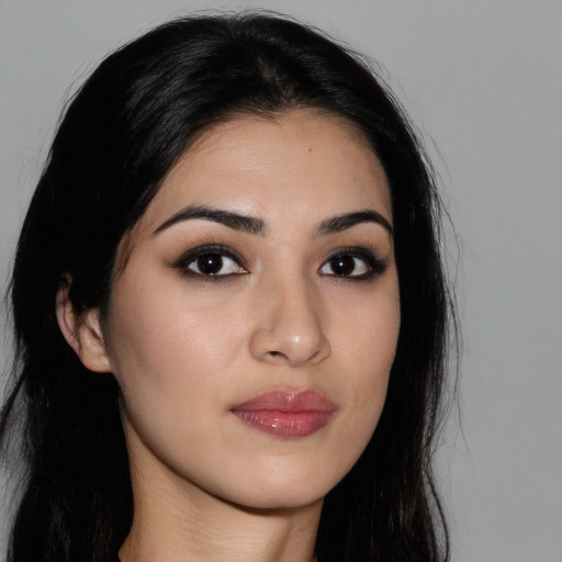 Neutral white young-adult female with long  black hair and brown eyes