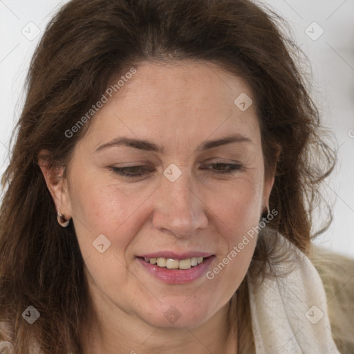 Joyful white adult female with long  brown hair and brown eyes