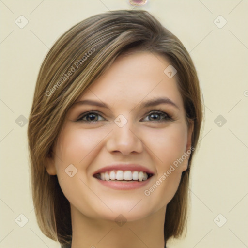 Joyful white young-adult female with long  brown hair and grey eyes