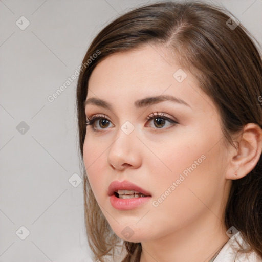 Neutral white young-adult female with medium  brown hair and brown eyes