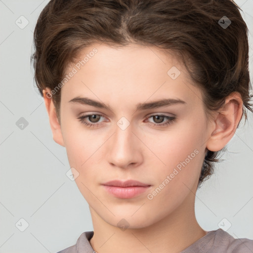 Neutral white young-adult female with short  brown hair and brown eyes