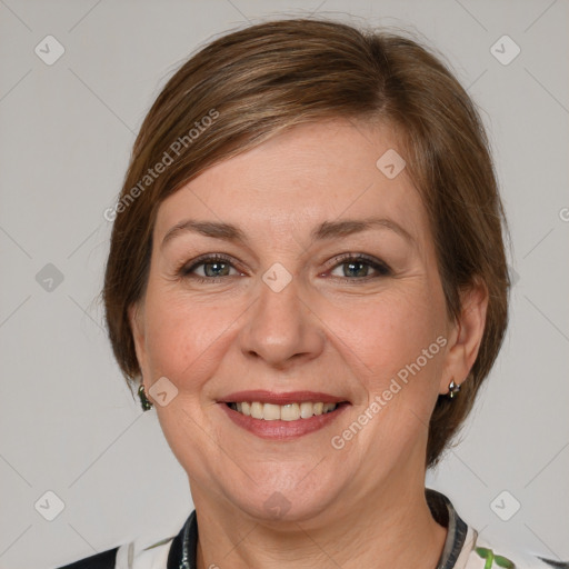 Joyful white adult female with medium  brown hair and grey eyes