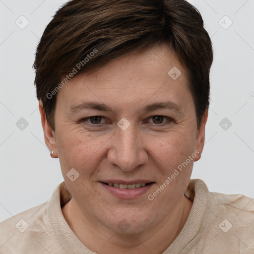 Joyful white adult female with short  brown hair and brown eyes